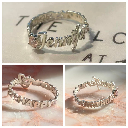 Custom personalized birthday ring with Jennifer name engraving, happy birthday lettering, and pink gemstones - handcrafted by POMTIQUE