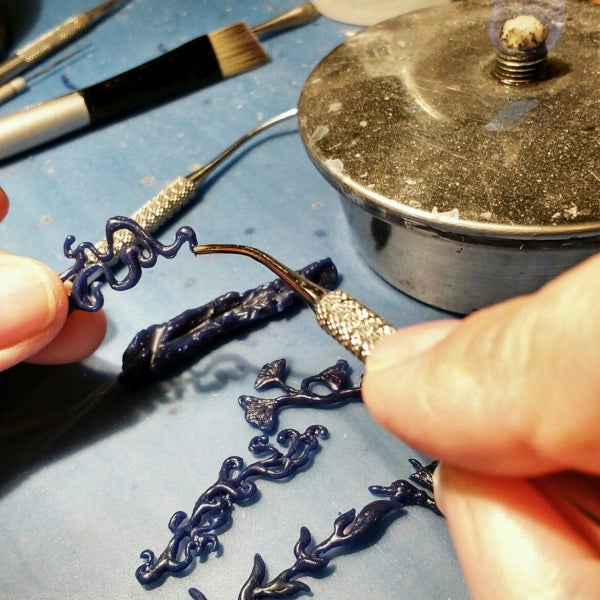 Hand-sculpted wax model used to create a custom jewelry pendant