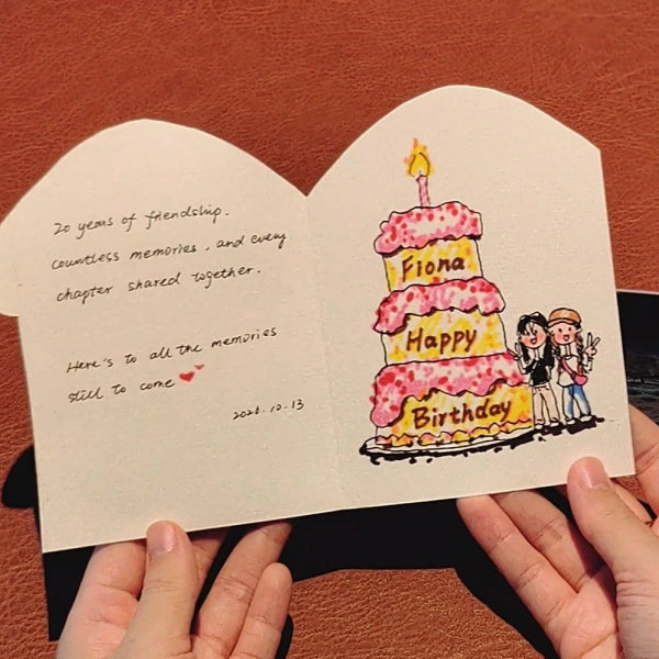 Open personalized watercolor birthday card with handwritten friendship message and custom birthday cake illustration 