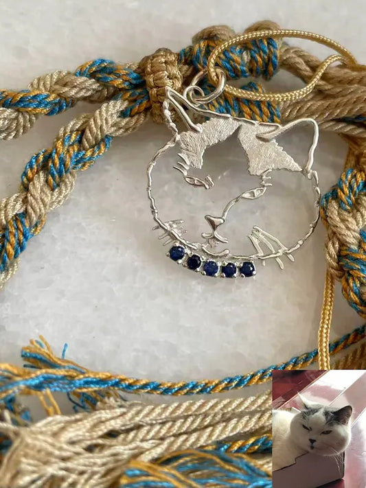 Custom cat portrait pendant in sterling silver with blue stones